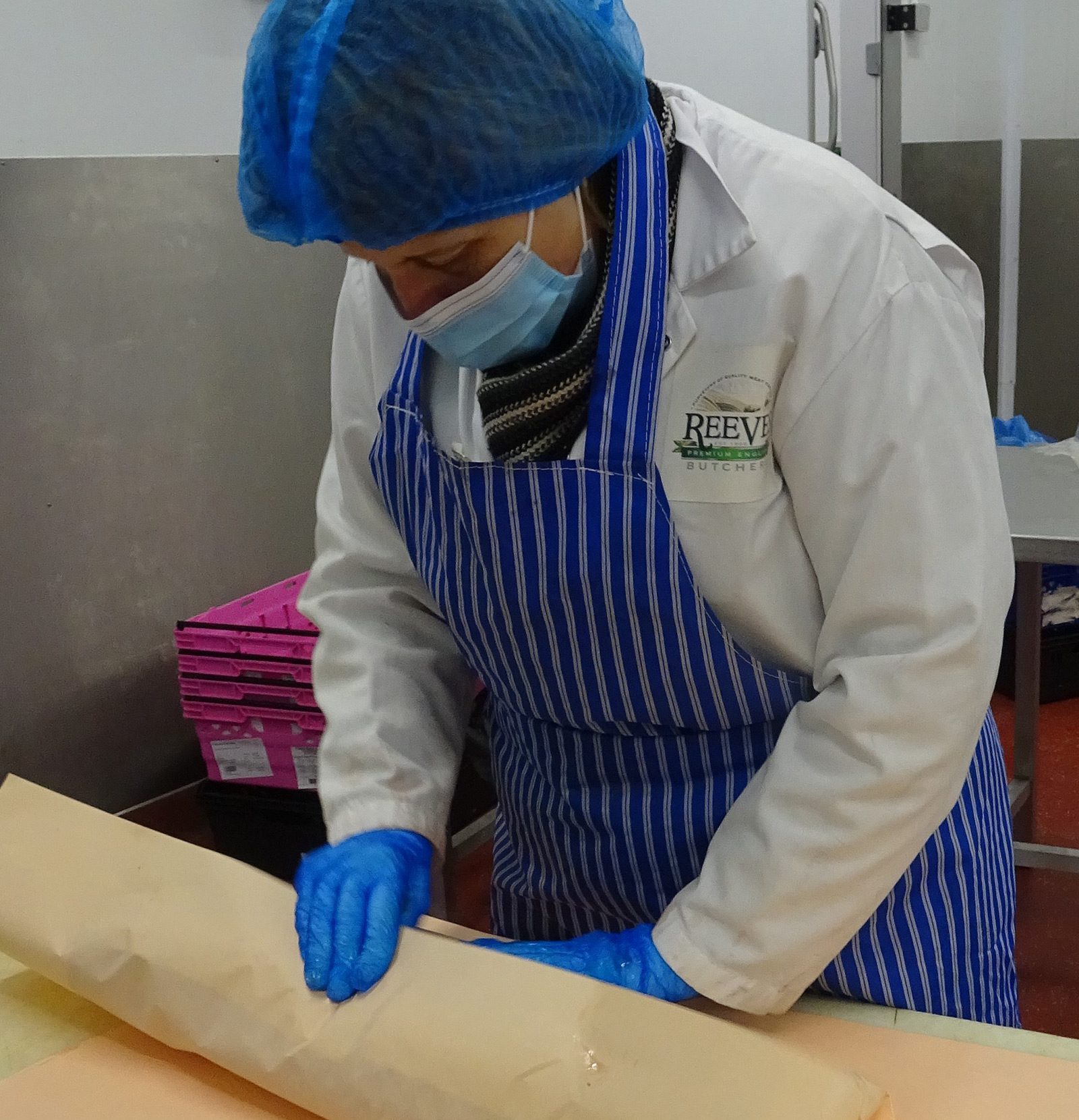 Butcher working in factory